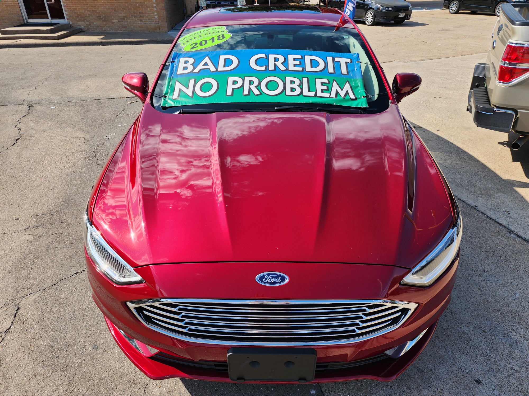 2018 RED Ford Fusion SE (3FA6P0HD2JR) with an 1.5L L4 DOHC 16V engine, 6A transmission, located at 2660 S.Garland Avenue, Garland, TX, 75041, (469) 298-3118, 32.885551, -96.655602 - Welcome to DallasAutos4Less, one of the Premier BUY HERE PAY HERE Dealers in the North Dallas Area. We specialize in financing to people with NO CREDIT or BAD CREDIT. We need proof of income, proof of residence, and a ID. Come buy your new car from us today!! This is a 2019 FORD FUSION SE SEDAN! - Photo #8
